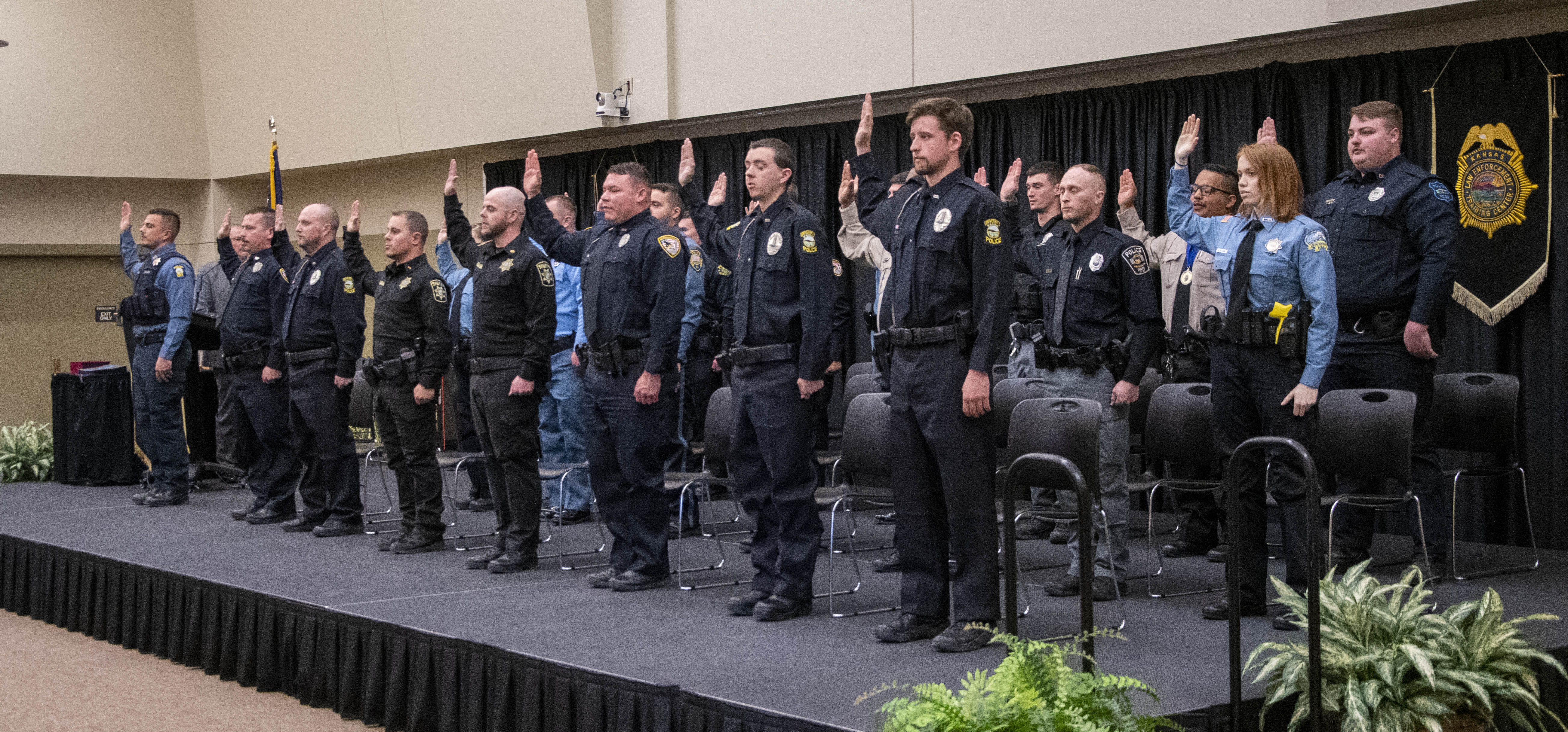 The 28th basic training class recites the oath of office.