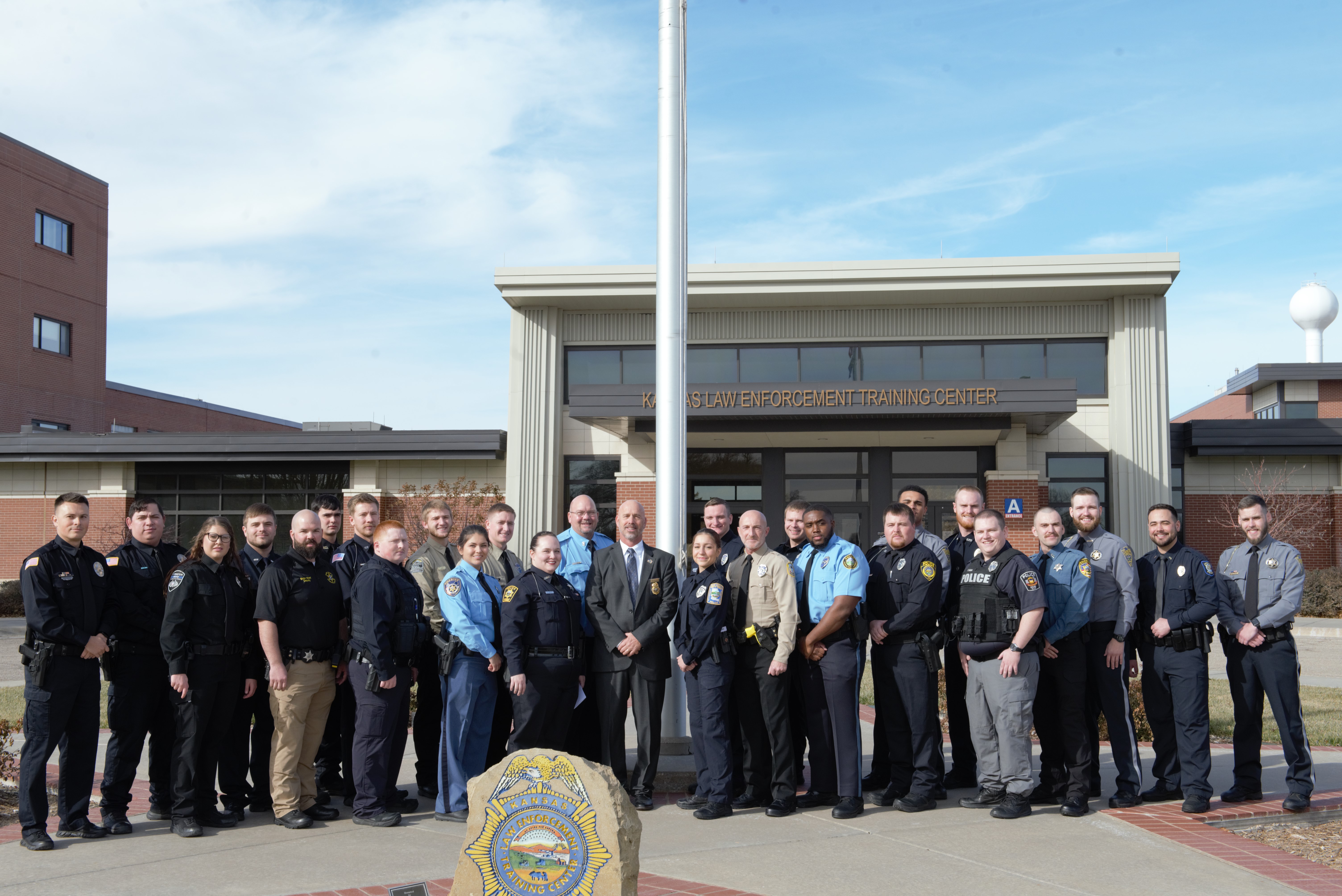 302nd Basic Training Class by KLETC Flag Pole