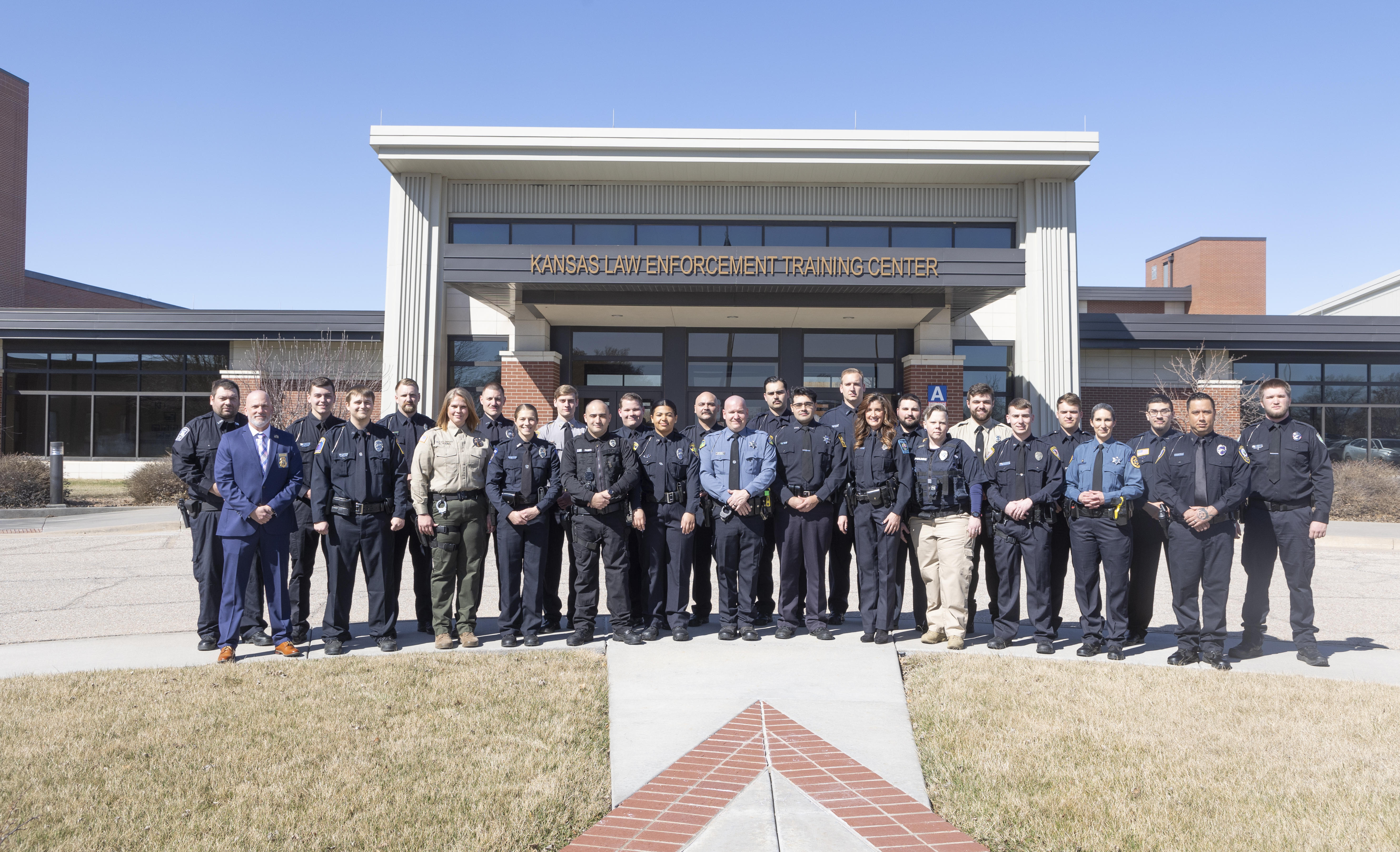 321st Basic Training Class by KLETC Flag Pole