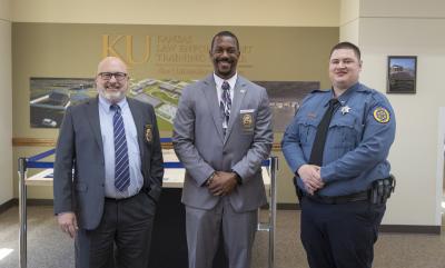 "Vice Provost Daren Beck, Brandon Johnson, Class President Tyler Walton"