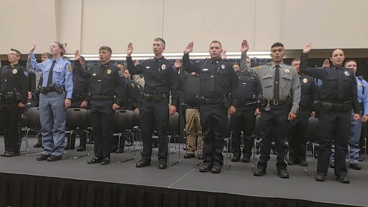 The 299th basic training class recites the oath of office.