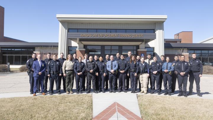 321st Basic Training Class by KLETC Flag Pole